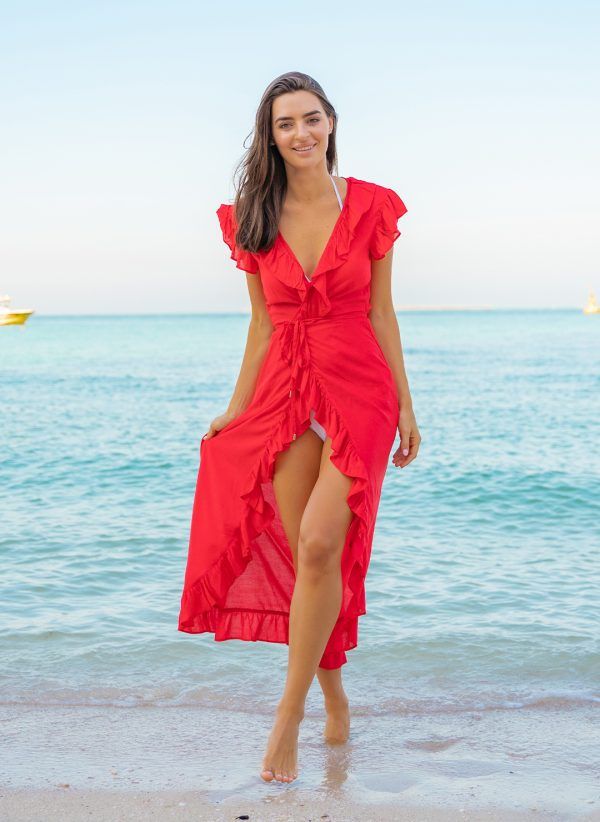 The Lizzie in red is a maxi length wrap dress that is perfect for wearing over swimwear. Part of the CAHA CAPO resortwear collection.