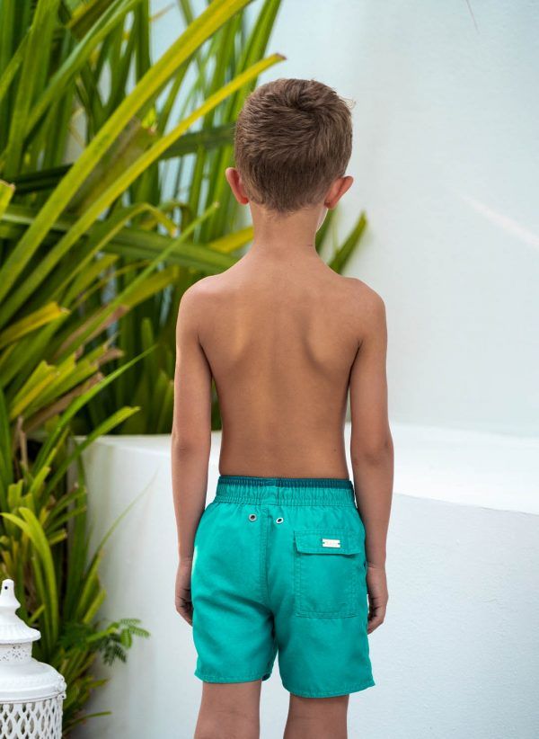The Gus are essential CAHA CAPO boardshorts in Turquoise. Part of the CAHA CAPO boy's swimwear collection.