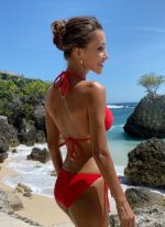 The Cherie tie-side bikini bottom in red by CAHA CAPO is part of our women's swimwear collection