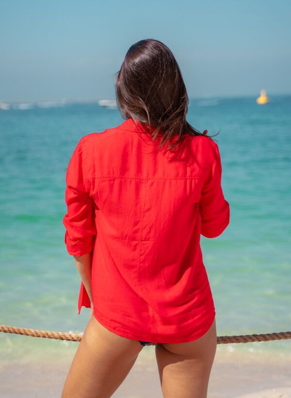 The Emma is an essential women's shirt in red. Made in viscose, it is part of the CAHA CAPO women's resortwear collection.