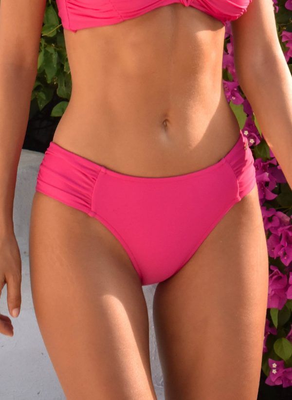 The Janice hot pink bikini bottom by CAHA CAPO is a supportive and stylish full coverage bikini bottom. Featuring CAHA CAPO trims