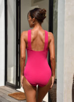 The Kim twist front One Piece swimsuit by CAHA CAPO is part of our women's swimwear collection, an essential hot pink One Piece.