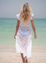 The Lizzie is an embroidery maxi length wrap dress that is perfect for wearing over swimwear. Part of the CAHA CAPO resortwear collection.