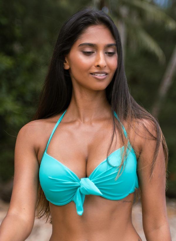 The Maria bikini top by CAHA CAPO is part of our women's swimwear collection, an essential turquoise halter bikini top.