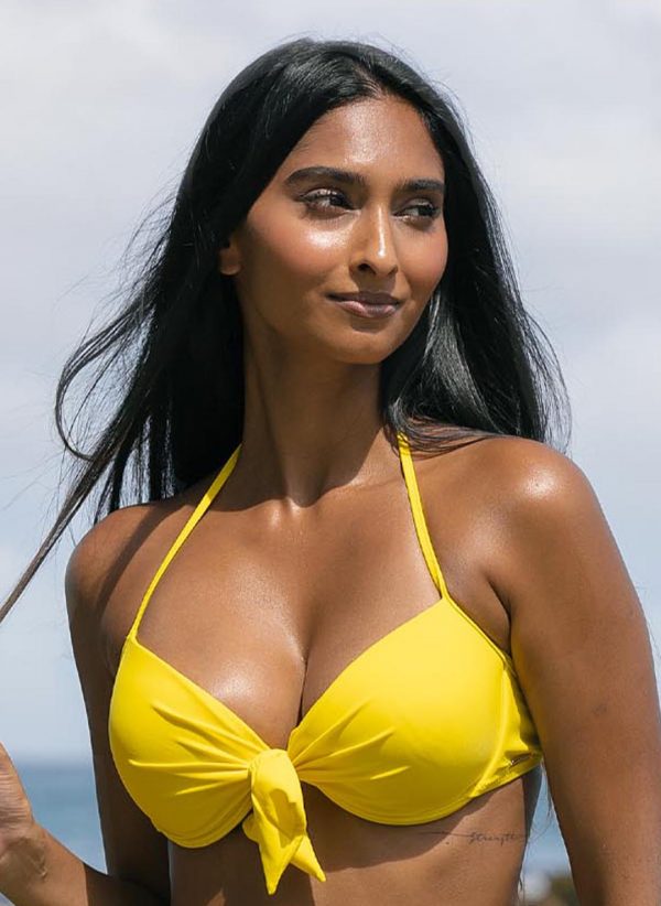 The Maria bikini top by CAHA CAPO is part of our women's swimwear collection, an essential yellow halter bikini top.