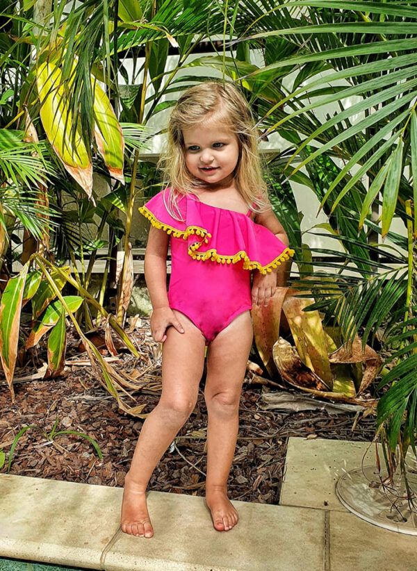 The Pippa Mini Capo One Piece swimsuit by CAHA CAPO is part of our girl's swimwear collection, an essential Hot Pink One Piece.