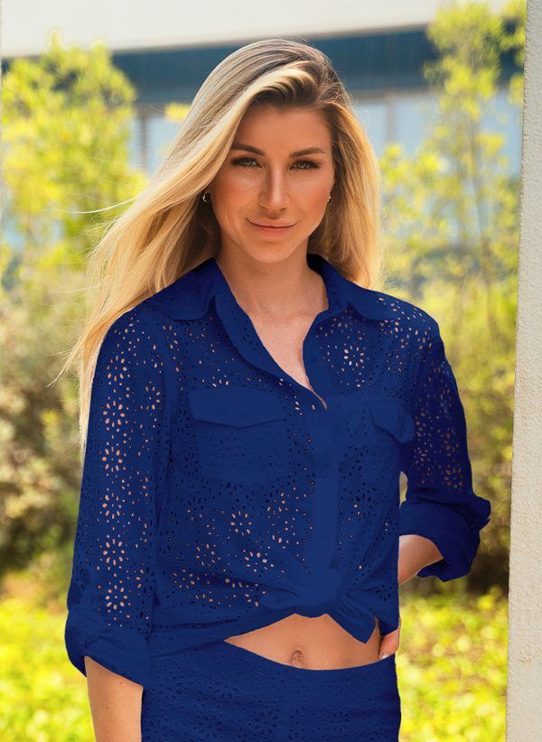 The Sophia in navy is made in Broderie Anglaise fabric. A casual women's shirt that is part of the CAHA CAPO women's resortwear collection.