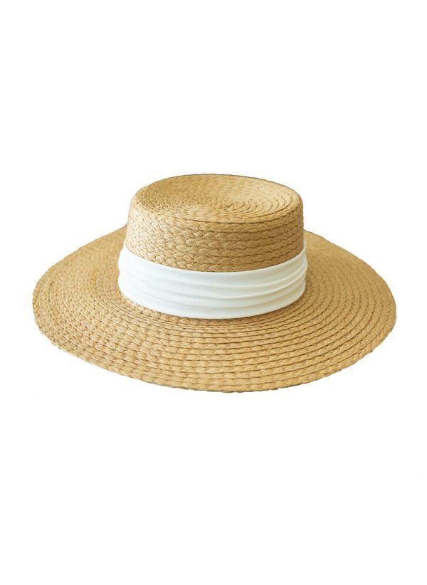 The Haven Hat is a wide brim sun hat by CAHA CAPO. Best worn with CAHA CAPO resortwear or swimwear for days at the beach.