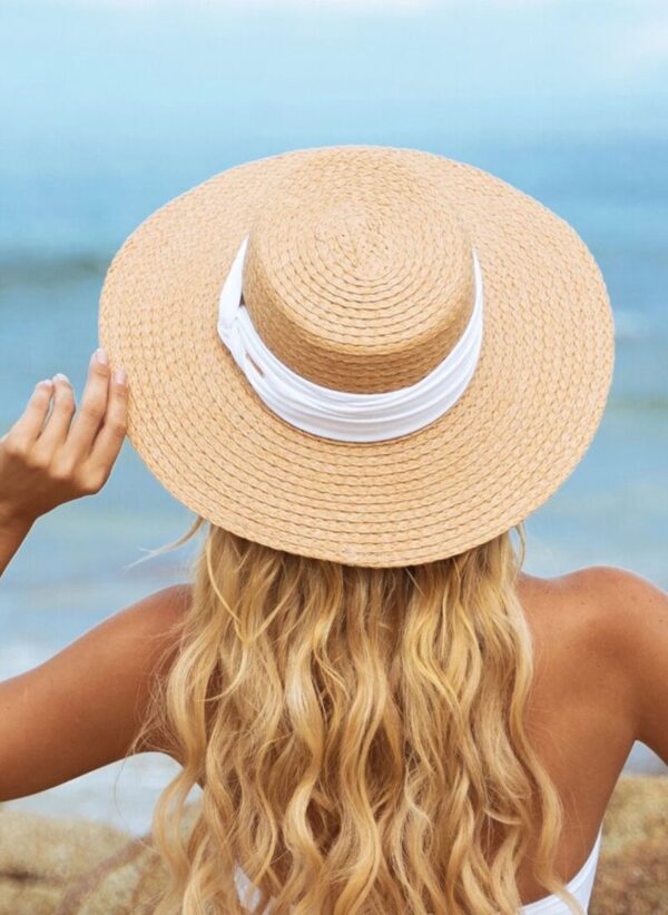 The Haven Hat is a wide brim sun hat by CAHA CAPO. Best worn with CAHA CAPO resortwear or swimwear for days at the beach.